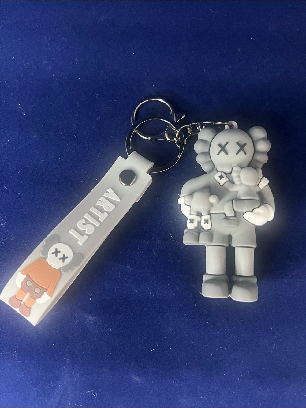 Kaws Gray Character Keyring with Orange Accent Tag